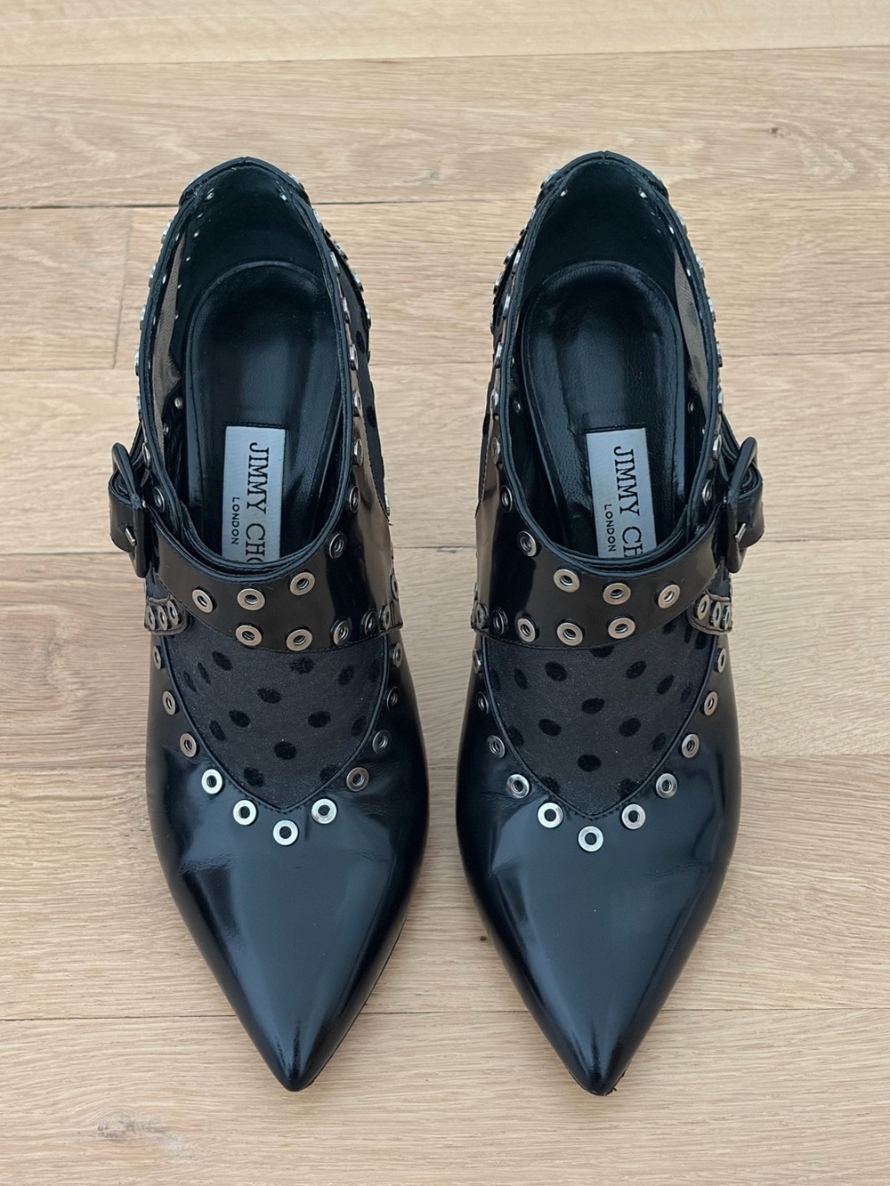 Jimmy Choo Black Patent Leather Ankle Pumps
Size 37.5
